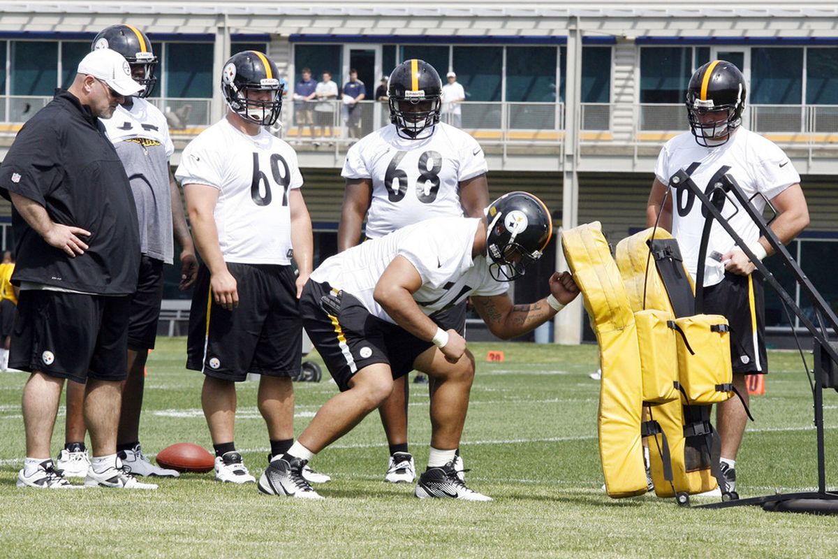May 4, 2012; Pittsburgh, PA, USA; Pittsburgh Steelers second round draft pick offensive linemen Mike Adams (front bottom) participates in drills during rookie minicamp and orientation. Mandatory Credit: Charles LeClaire-US PRESSWIRE