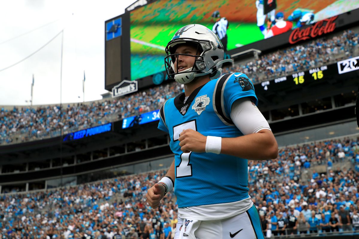 Kyle Allen of the Carolina Panthers reacts after his team scores a touchdown against the Jacksonville Jaguars during their game at Bank of America Stadium on October 06, 2019 in Charlotte, North Carolina.