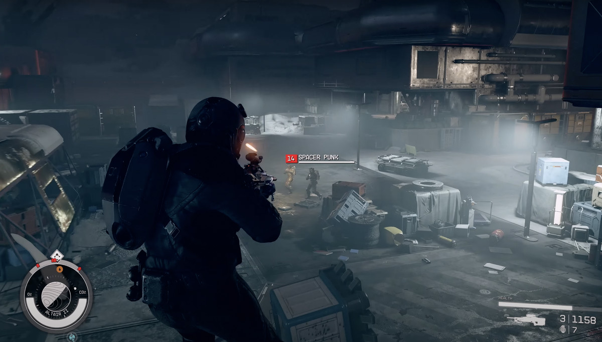 A Starfield player pointing their gun at others, in an abandoned warehouse.