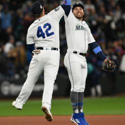 APRIL 15: Seattle Mariners first baseman Ty France and third baseman Eugenio Suarez celebrate after defeating the Colorado Rockies at T-Mobile Park