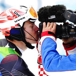Croatia's Ivica Kostelic kisses the camera in the finish area during the men's slalom event at Whistler Creekside alpine skiing venue during the 2010 Vancouver Olympics on Saturday.