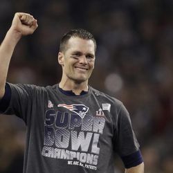 New England Patriots' Tom Brady raises his fist after his team defeated the Atlanta Falcons in overtime at the NFL Super Bowl 51 football game Sunday, Feb. 5, 2017, in Houston. The Patriots defeated the Falcons 34-28. (AP Photo/Darron Cummings)