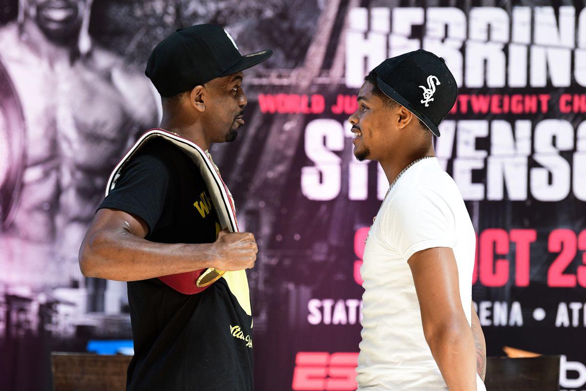 Jamel Herring (L) and Shakur Stevenson (R) face-off during their press conference for the WBO super featherweight championship at Omni Atlanta Hotel at CNN Center on September 09, 2021 in Atlanta, Georgia.