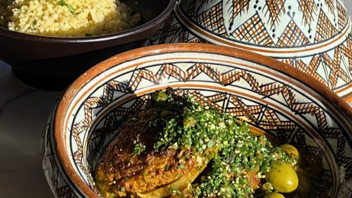A decorated tagine and bowl of chicken tagine.