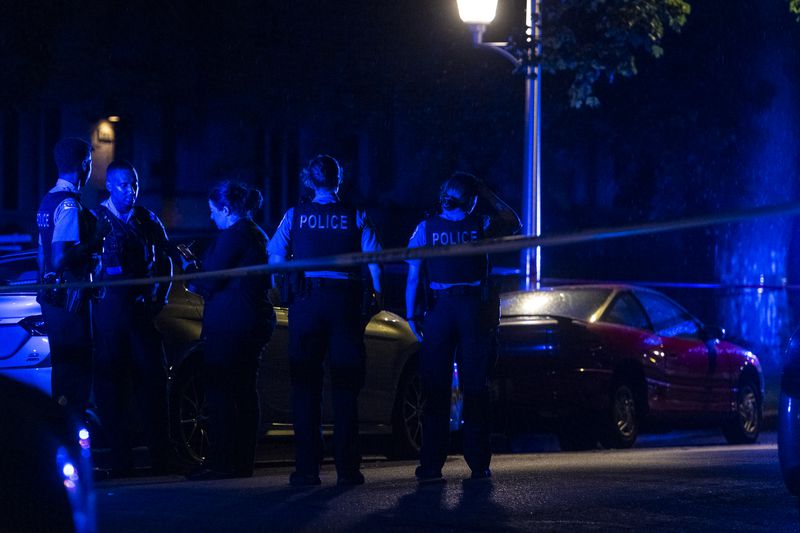 Chicago police work the scene where four people were shot in the 7000 block of South Indiana Ave, in the Park Manor neighborhood, Saturday, June 26, 2021. | Tyler LaRiviere/Sun-Times