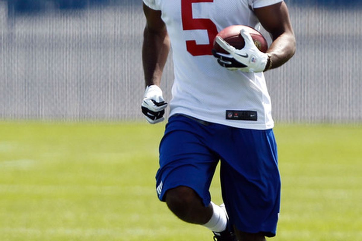 May 11, 2012; East Rutherford, NJ, USA; New York Giants wide receiver Limas Sweed (5) carries a pass during minicamp at the Timex Performance Center. Mandatory Credit: Debby Wong-US PRESSWIRE