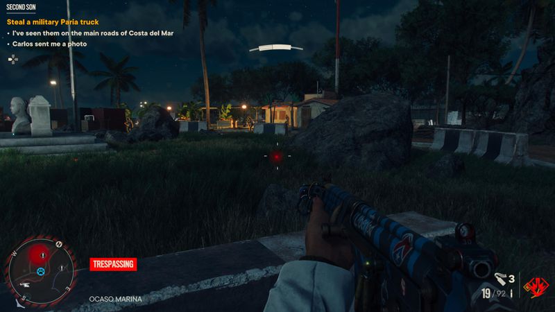 Enemies fighting on a base at night in Far Cry 6