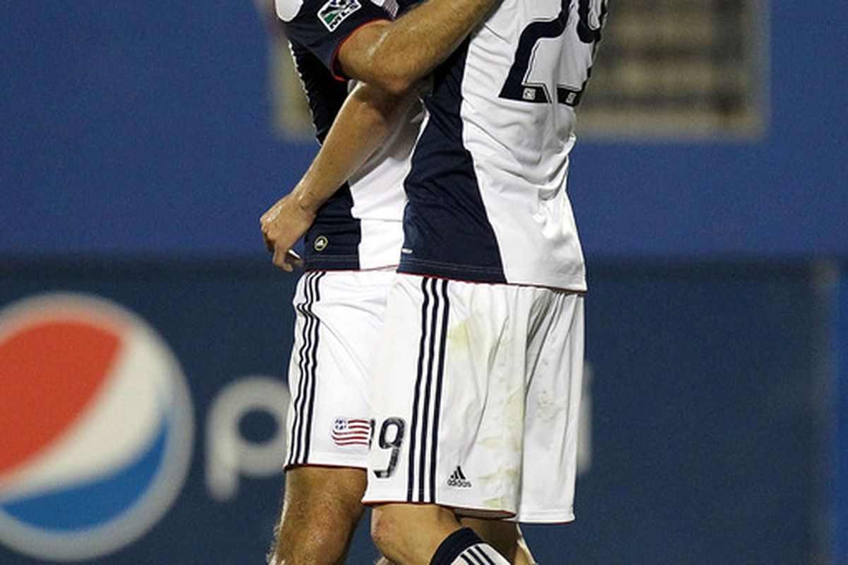 FRISCO TX - SEPTEMBER 22:  (L-R) Forward Ilija Stolica #9 of the New England Revolution celebrates  a goal with Marko Perovic #29 against FC Dallas at Pizza Hut Park on September 22 2010 in Frisco Texas.  (Photo by Ronald Martinez/Getty Images)