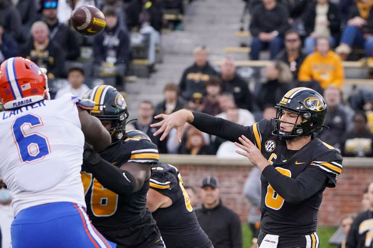 Missouri Tigers quarterback Connor Bazelak throws a pass abasing the Florida Gators during the first half at Faurot Field at Memorial Stadium.&nbsp;