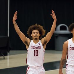 PULLMAN, WA - DECEMBER 2: Washington State guard Isaac Bonton (10) celebrates a 59-55 victory at the conclusion of the Pac 12 matchup between the Oregon State Beavers and the Washington State Cougars on December 2, 2020, at Beasley Coliseum in Pullman, WA.