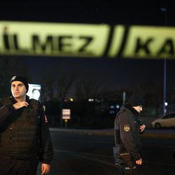 Turkish police officer cordon off the roads leading to the area of the Besiktas football club stadium, in Istanbul, late Saturday, Dec. 10, 2016. Two loud explosions have been heard near the newly built soccer stadium and witnesses at the scene said gunfire could be heard in what appeared to have been an armed attack on police. Turkish authorities have banned distribution of images relating to the Istanbul explosions within Turkey. 