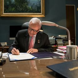 Sen. Orrin Hatch, R-Utah, signs a bill in his office in the Hart Senate Office Building in Washington, D.C., on Thursday, Jan. 19, 2017. The bill provides a waiver allowing James Mattis to serve as secretary of defense despite not being out of the military for the seven years required for that job. It is expected to be the first bill signed by President Donald Trump after his inauguration.