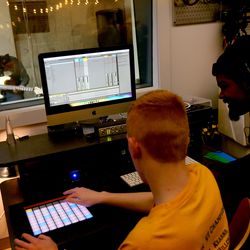 Eli Sackett plays guitar in a studio as Cameron Evans treats a musical piece with Myke Johnson, audio programs mentor, at Spy Hop in Salt Lake City on Friday, Feb. 15, 2019. Sackett and Evans are students of the Utah Schools for the Deaf and the Blind.