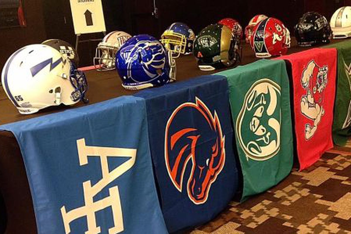 Helmets of the 12 members of the Mountain West Conference on display at the league’s football media days