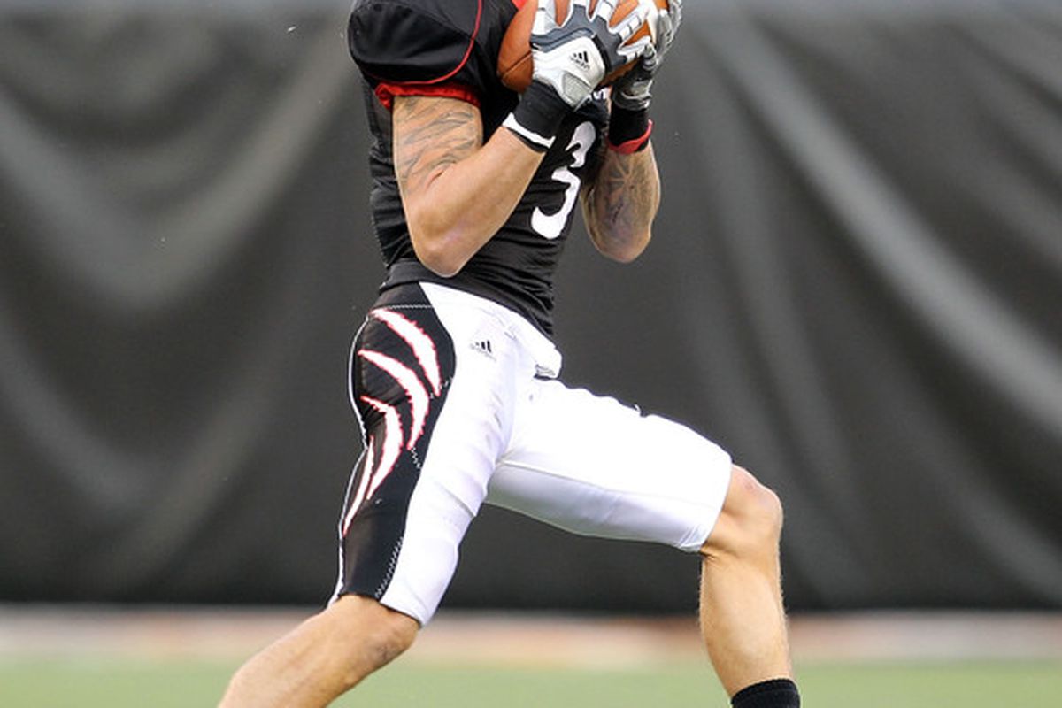 CINCINNATI - SEPTEMBER 25:  D J Woods #3 of the Cincinnati Bearcats catches a pass during the game against the Oklahoma Sooners at Paul Brown Stadium on September 25 2010 in Cincinnati Ohio.  (Photo by Andy Lyons/Getty Images)