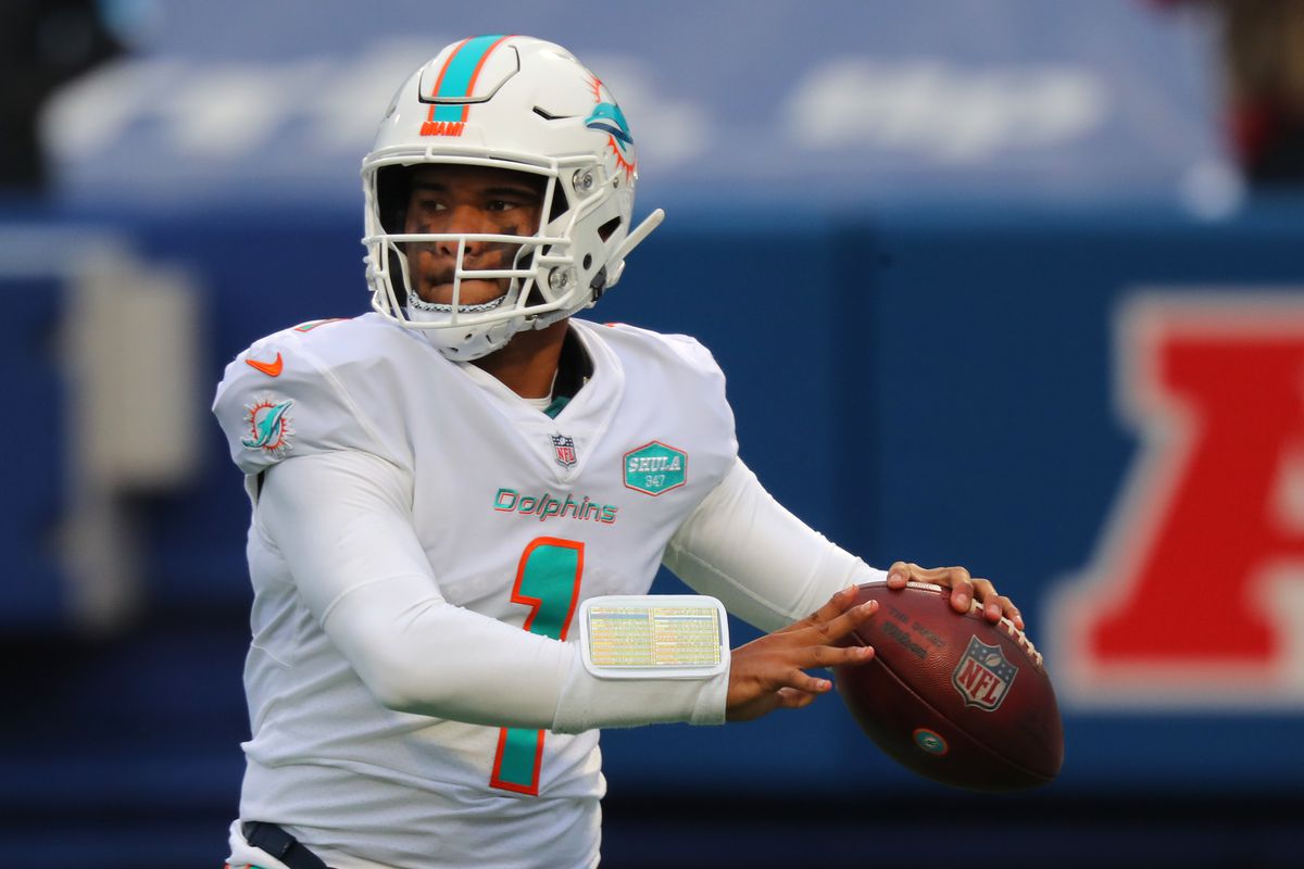 Tua Tagovailoa #1 of the Miami Dolphins looks to throw a pass against the Buffalo Bills at Bills Stadium on January 3, 2021 in Orchard Park, New York.