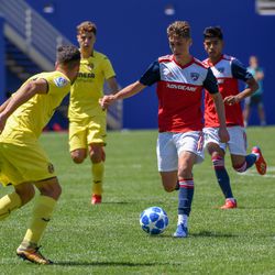 Benjamin Redzic (11) dribbling during the opening match of the 40th Annual Dallas Cup. 