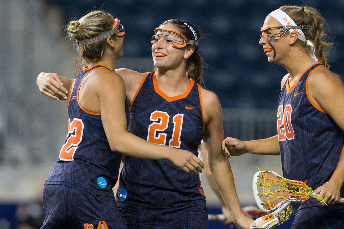 May 22, 2015; Philadelphia, PA, USA; Syracuse Orange midfielder Taylor Gait (22) celebrates with attacker Kayla Treanor (21) and midfielder Gabby Jaquith (20) after scoring a goal against the Maryland Terrapins during the first half at PPL Park.