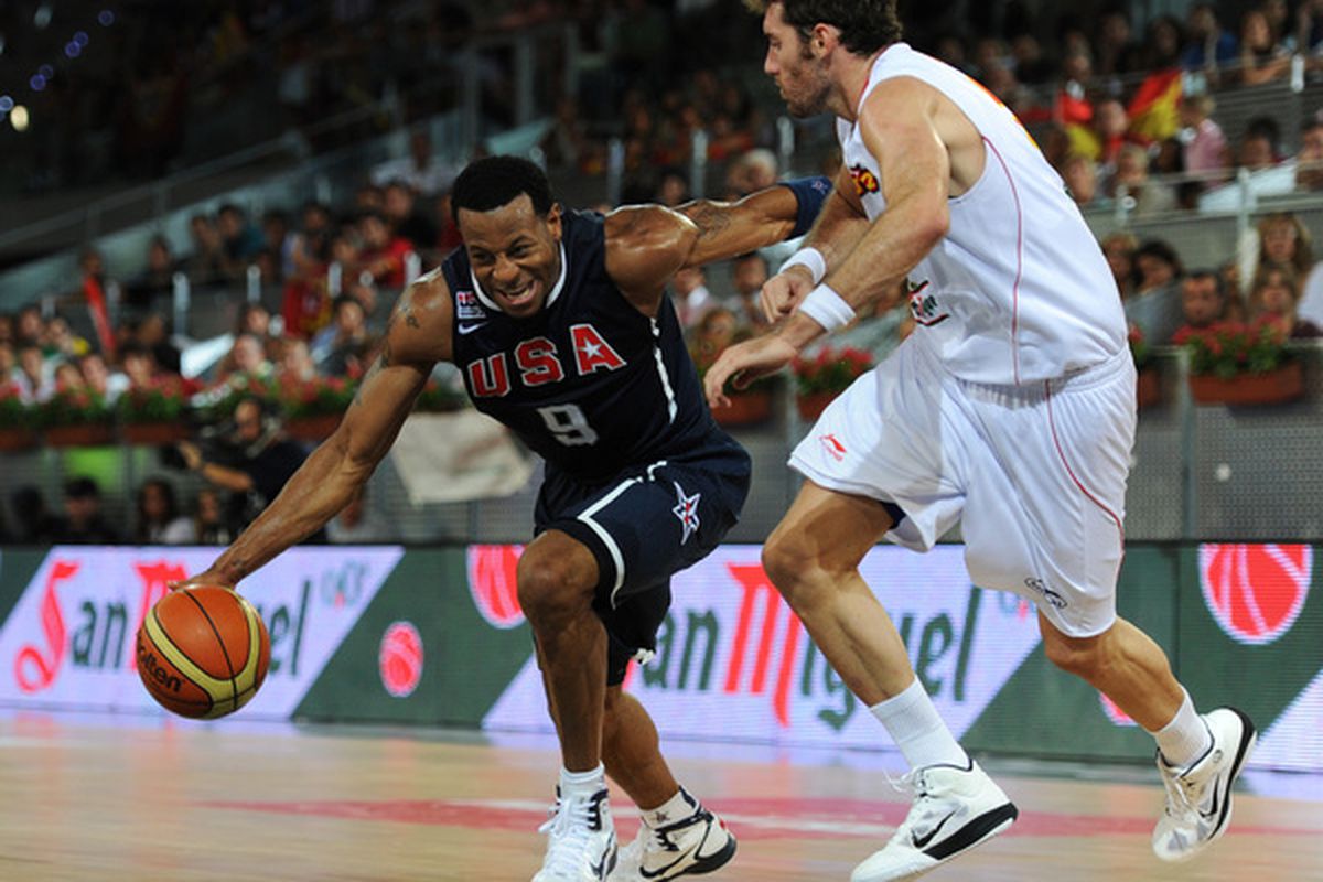 MADRID SPAIN - AUGUST 22:  Andre Iguodala (L) of the USA drives past Rudy Fernandez of Spain during a friendly basketball game between Spain and the USA at La Caja Magica on August 22 2010 in Madrid Spain.  (Photo by Jasper Juinen/Getty Images)