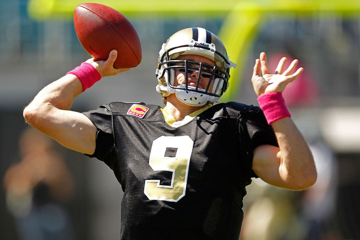 JACKSONVILLE, FL - OCTOBER 02:  Drew Brees #9 of the New Orleans Saints warms up during a game against the Jacksonville Jaguars at EverBank Field on October 2, 2011 in Jacksonville, Florida.  (Photo by Mike Ehrmann/Getty Images)