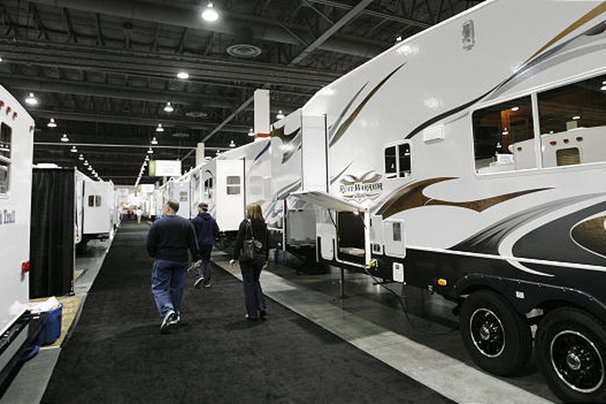 Visitors to the Utah Sportsmen's Vacation and RV Show walk through the displays of trailers and other recreational vehicles on Thursday at South Towne Expo Center, 9575 S. State in Sandy. The show is open today from noon to 10 p.m. 