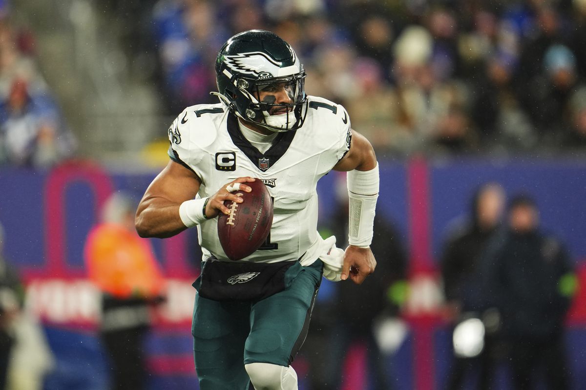Jalen Hurts #1 of the Philadelphia Eagles scrambles out of the pocket during an NFL football game against the New York Giants at MetLife Stadium on January 7, 2024 in East Rutherford, New Jersey.