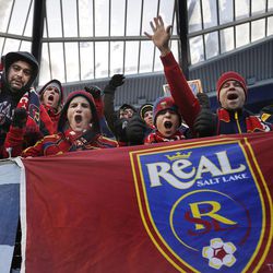 Real Salt Lake fans cheer as they get set for the game between Sporting KC and RSL at Sporting Park Saturday, Dec. 7, 2013 in MLS Cup action.