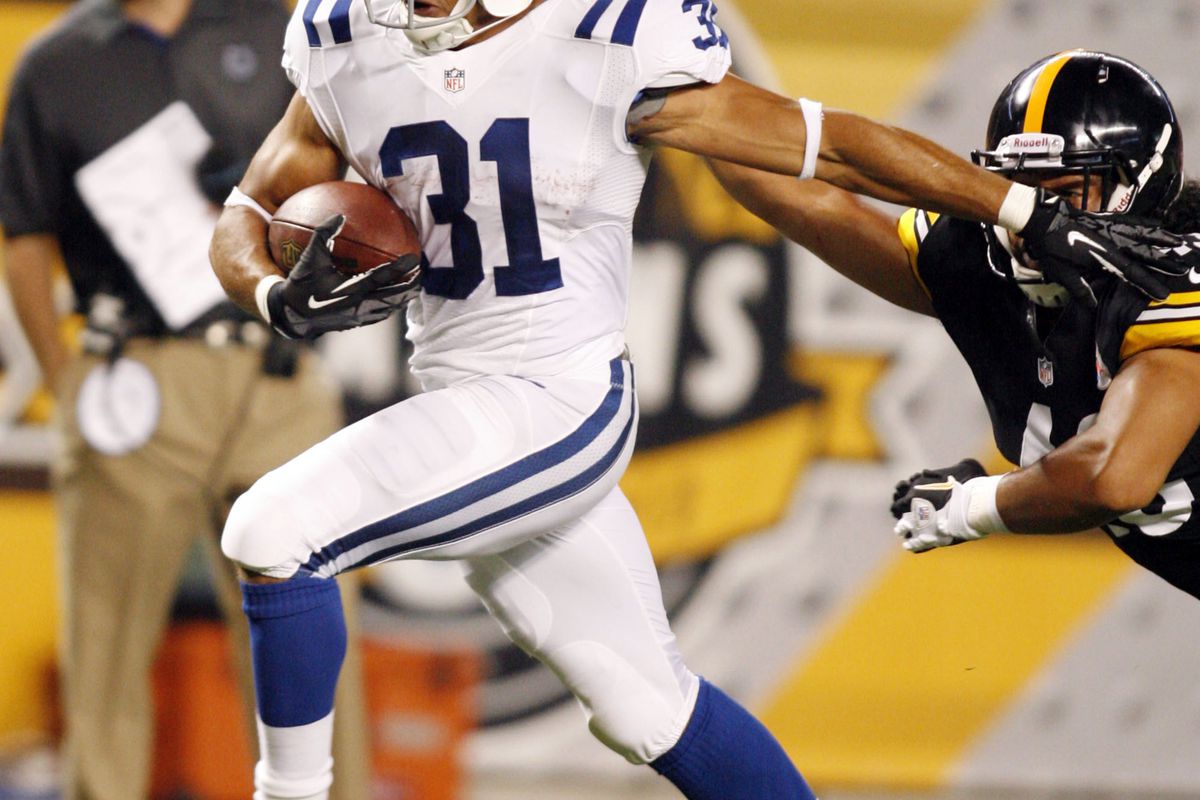 August 19, 2012; Pittsburgh, PA, USA; Indianapolis Colts running back Donald Brown (31) carries the ball against the Pittsburgh Steelers during the second quarter at Heinz Field. Mandatory Credit: Charles LeClaire-US PRESSWIRE