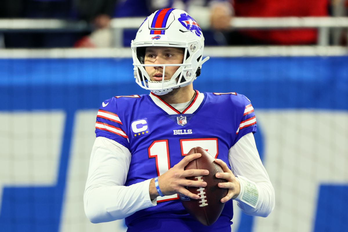 Buffalo Bills quarterback Josh Allen (17) looks to throw the ball ahead of an NFL football game between the Buffalo Bills and the Cleveland Browns in Detroit, Michigan USA, on Sunday, November 20, 2022.