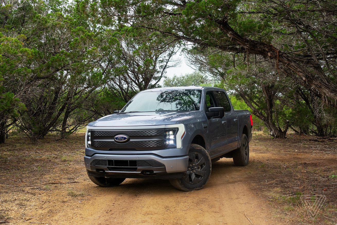 Ford F-150 Lightning in the woods.