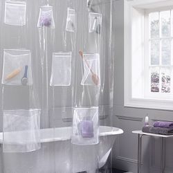Okay, this <a href="http://www.opulentitems.com/Pocket-Shower-Curtains_p_1526.html" rel="nofollow">pocket shower curtain</a> only costs twenty bucks, but we want one.