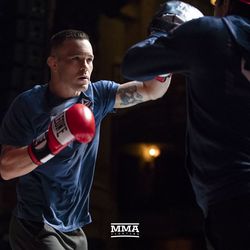 Colby Covington hits mitts at UFC 225 open workouts.