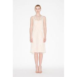 <b>Tome</b> Tulle Embroidered Dress, <a href="http://tomenyc.bigcartel.com/product/tulle-dress-w-slip">$995</a>