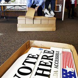 Beverly Noorda, left and Malinda Bills prepare for voting at Sandy Elementary School in Sandy, Monday, Nov. 7, 2011.