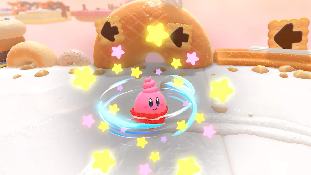 Kirby looks like a cupcake using the Tornado ability in Kirby’s Dream Buffet