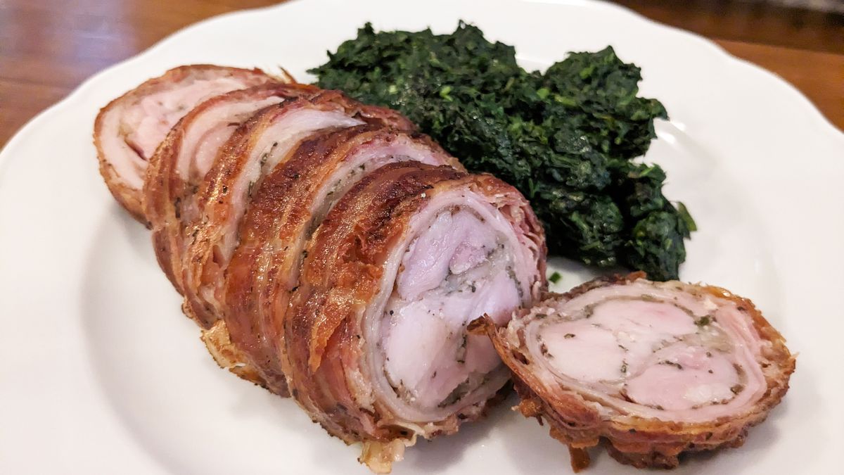 Rounds of pale meat wrapped in a brown crust.