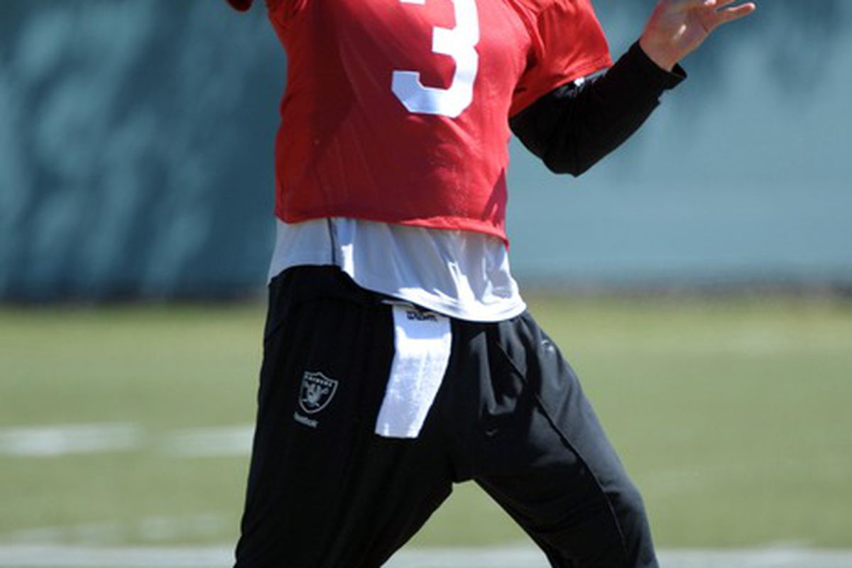 May 22, 2012; Alameda, CA, USA; Oakland Raiders quarterback Carson Palmer (3) throws a pass during organized team activities at the Raiders practice facility. Mandatory Credit: Kirby Lee/Image of Sport-US PRESSWIRE