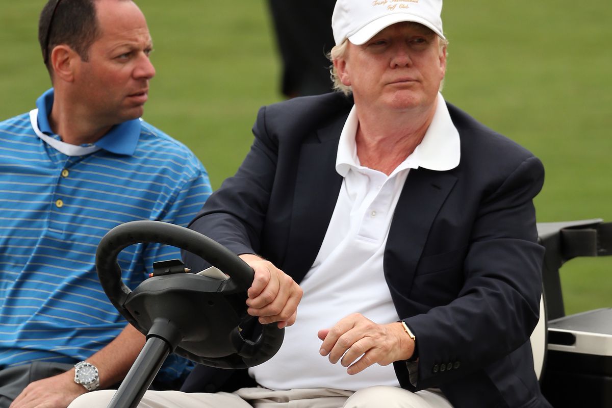 Chairman and president of the Trump Organization Donald Trump drives a golf cart during the third round of the World Golf Championships-Cadillac Championship at Trump National Doral Blue Monster Course on March 7, 2015, in Doral, Florida.