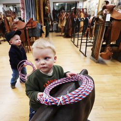 Wyatt Peterson and Jubal Knight play with ropes for sale at J.M. Capriola in Elko, Nev., on Tuesday Jan 26, 2021.