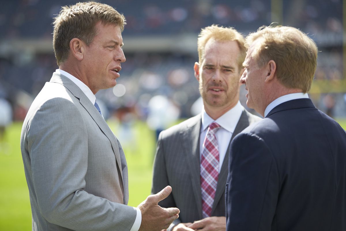 Fox Sports announcers Troy Aikman (L) and Joe Buck (C) with NFL commissioner Roger Goodell on field before Chicago Bears vs Green Bay Packers game at Soldier Field. Chicago, IL 9/13/2015