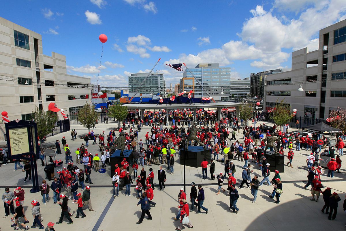WASHINGTON, DC - APRIL 12:  Fans enter Nationals Park during openinig day between the Cincinnati Reds and Washington Nationals on April 12, 2012 in Washington, DC.  (Photo by Rob Carr/Getty Images)