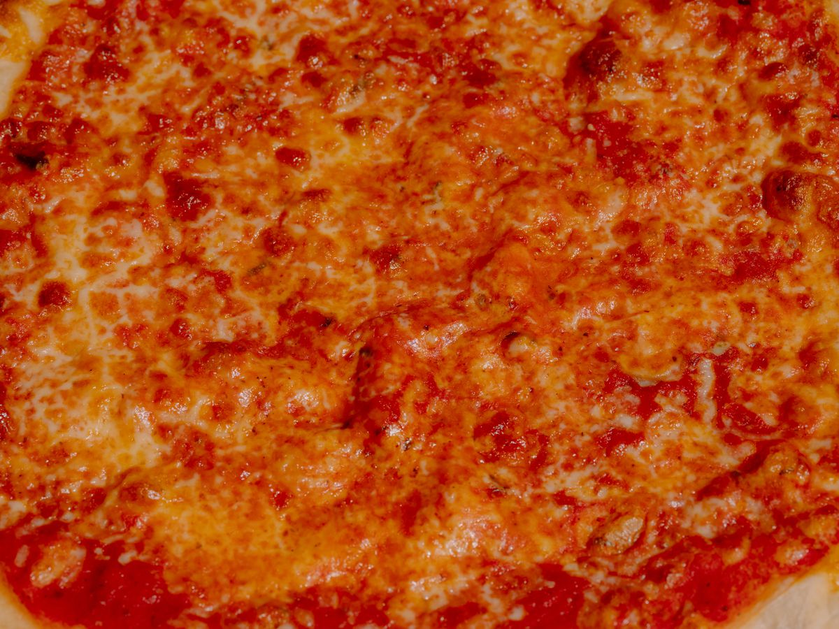 A close up of a cheese pie.