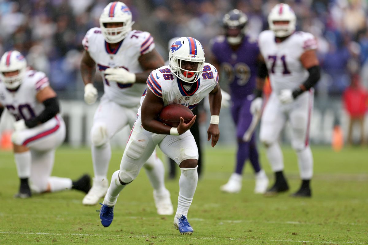 Running back Devin Singletary #26 of the Buffalo Bills runs with the ball against the Baltimore Ravens at M&amp;T Bank Stadium on October 02, 2022 in Baltimore, Maryland.
