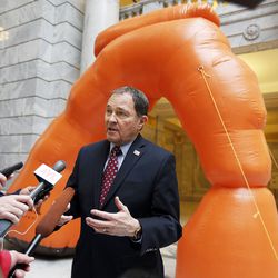 Gov. Gary Herbert talks with members of the media during Tourism Day at the Capitol in Salt Lake City on Monday, Jan. 22, 2018.