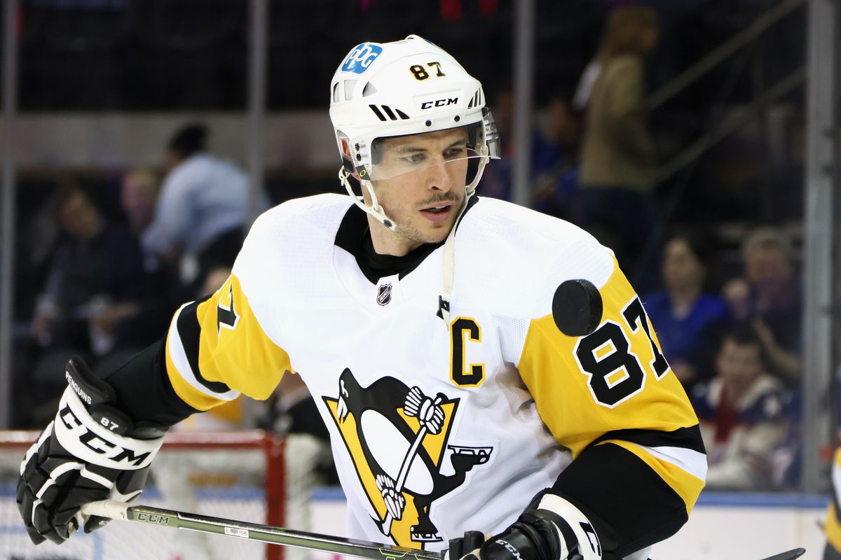 Sidney Crosby #87 of the Pittsburgh Penguins plays with the puck during warm-ups prior to playing against the New York Rangers in Game Five of the First Round of the 2022 Stanley Cup Playoffs at Madison Square Garden on May 11, 2022 in New York City.