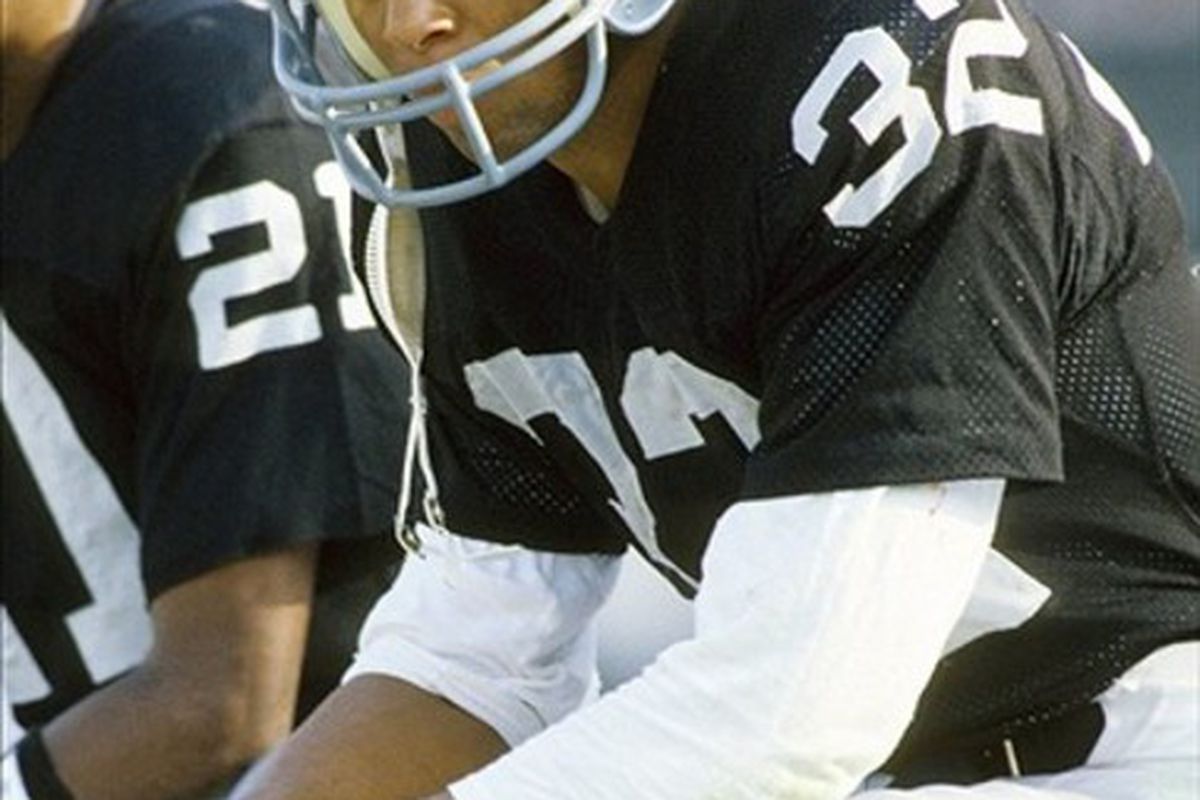 Unknown date; Los Angeles, CA, USA; FILE PHOTO; Los Angeles Raiders running back Marcus Allen on the bench at the Los Angeles Memorial Coliseum. Mandatory Credit: Richard Mackson-US PRESSWIRE
