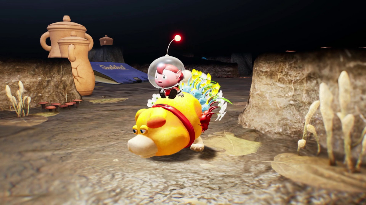 in a scene from PIkmin 4, an astronaut rides a dog creature, Oatchi, with many pikmin on its back