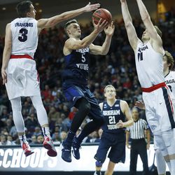 Brigham Young Cougars guard Kyle Collinsworth (5) drives on Gonzaga Bulldogs guard Kyle Dranginis (3) during the WCC tournament in Las Vegas Monday, March 7, 2016.  BYU lost 88-84.