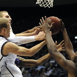BYU guard Tyler Haws (3) and Brigham Young Cougars forward Nate Austin (33) fight for a rebound with Prairie View A&M Panthers forward Rasi Jenkins (22) during a game at the Marriott Center in Provo on Wednesday, Dec. 11, 2013.