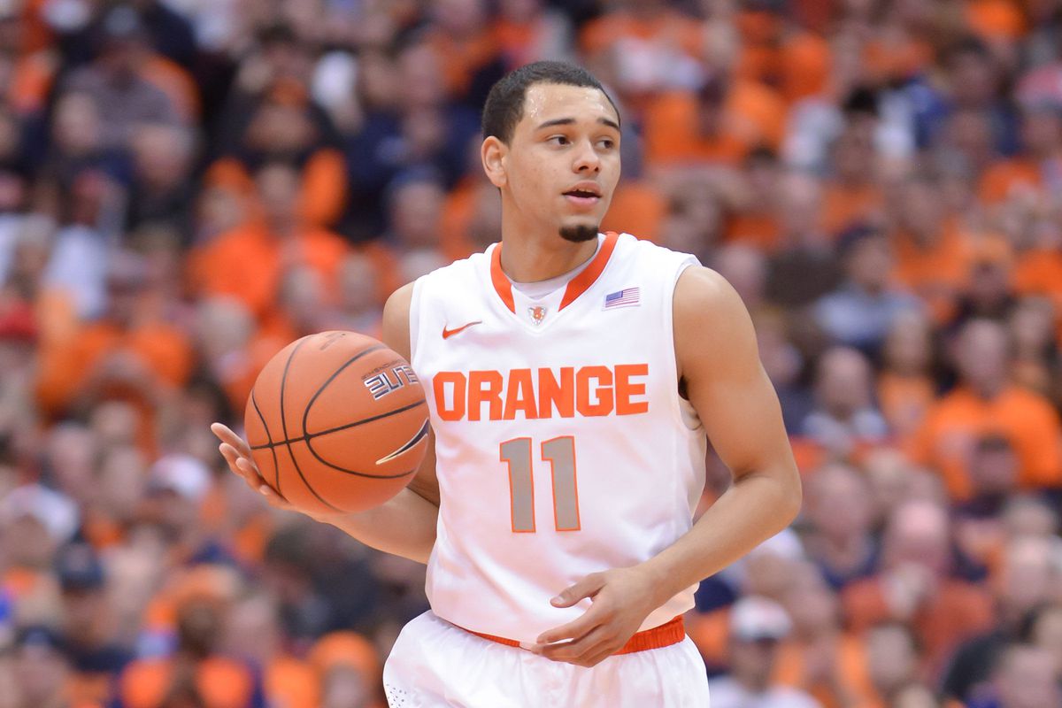 Syracuse Orange guard Tyler Ennis (11) brings the ball up court during the second half of a game against the Miami Hurricanes at the Carrier Dome.